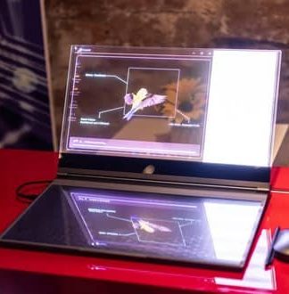 لنوو با ارائه اولین لپ تاپ شفاف جهان موجب هیجان شدید علاقه‌مندان شد + ویدیو
